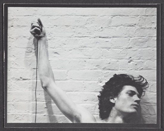 Mapplethorpe_Identical-self-portaits-of-Robert-Mapplethorpe-with-trip-cable-in-hand,-1974.jpg