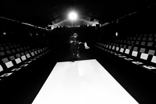 The runway is cleaned between shows during Toronto Fashion Week, March 2009. From the series 'Toronto Fashion Week'

© Aaron Vincent Elkaim