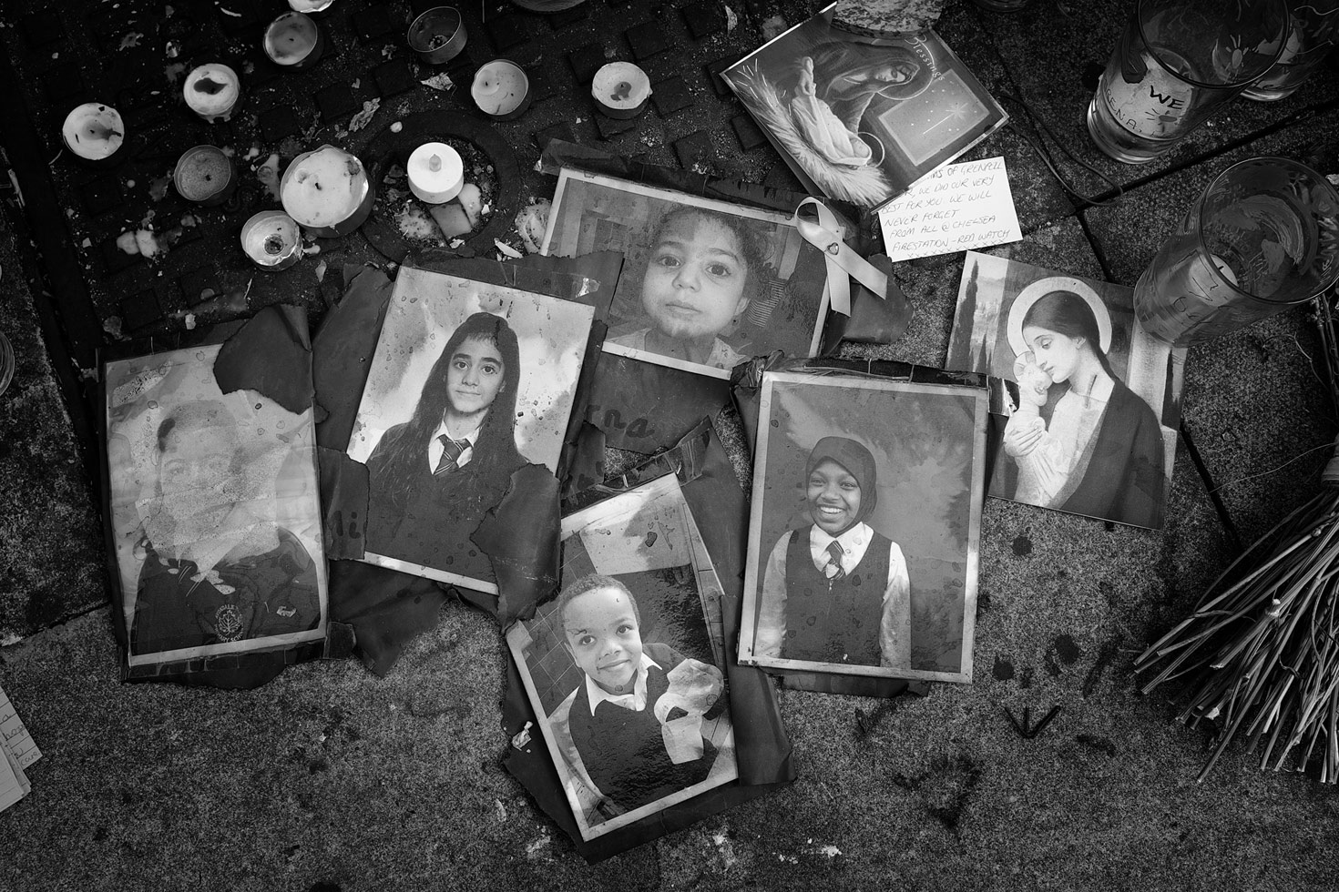 Photographs of missing children, Latymer Community Centre, Bramley Road.