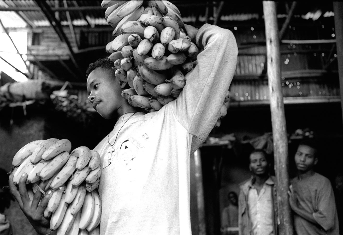 Bruke delivering bananas in exchange for food.