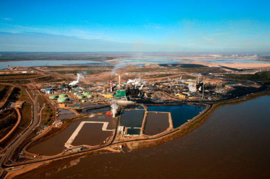 Aerial view of Suncor upgrader plant next to the Athabasca river north of Fort McMurray, northern Alberta, Canada, 2007
