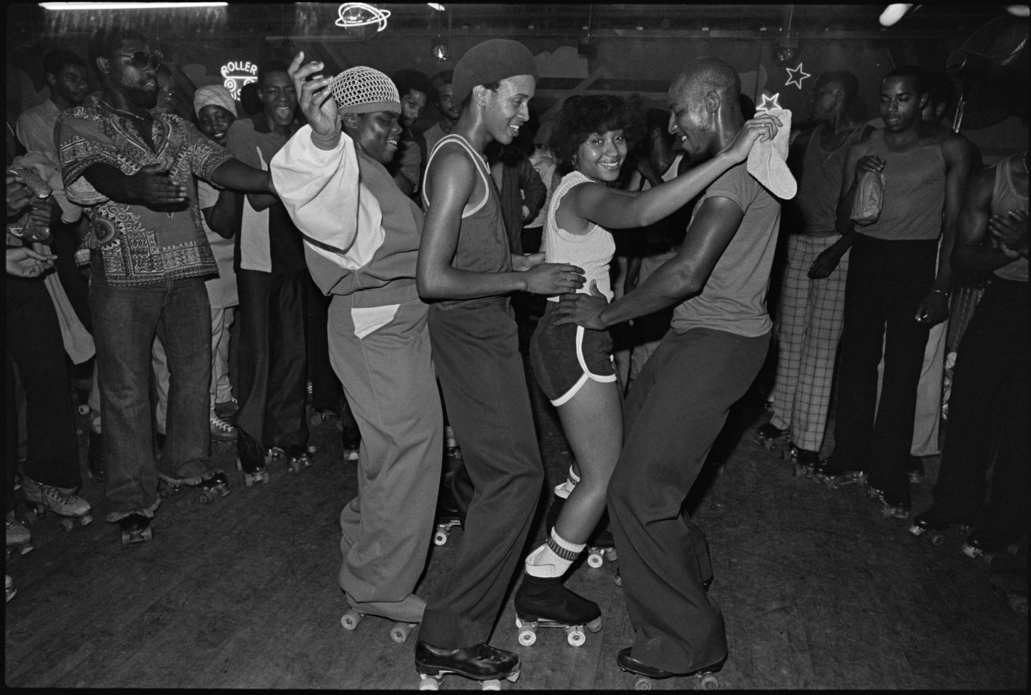 "The Empire Roller Skating Rink in Crown Heights, Brooklyn opened in 1941 and finally closed its doors in 2007. It converted into a roller disco in the 70s and then the roller rink organ was replaced with a sound system and DJ booth. Empire was usually packed with an African-American crowd but top skaters of all races and creeds also came."