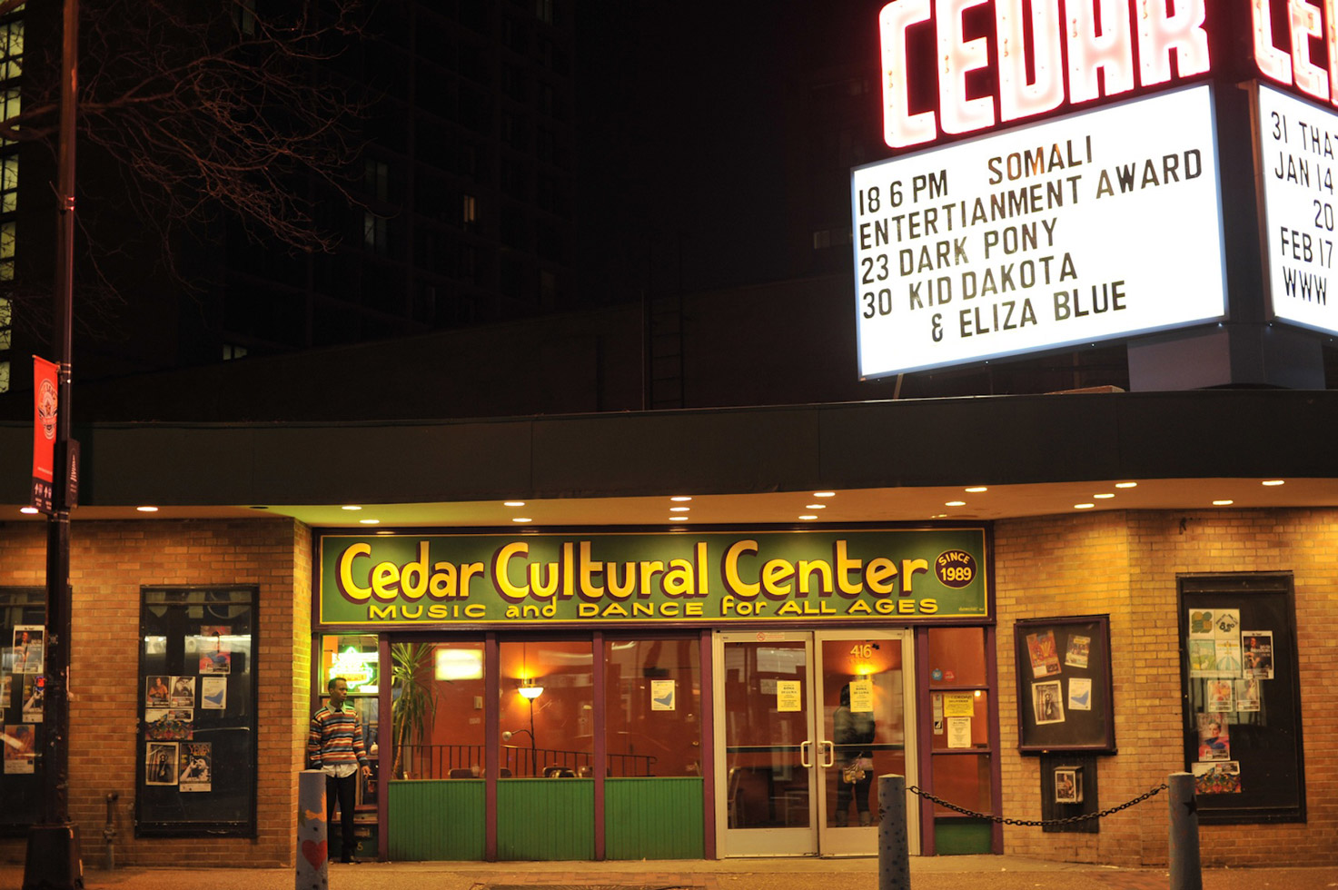 A young Somali man waits outside the Cedar Cultural Center, host of the 2011 Somali Entertainment Awards. Since Minneapolis has one of the largest collective communities in the diaspora, famous artists, athletes, and musicians came from around the world to collect their awards.