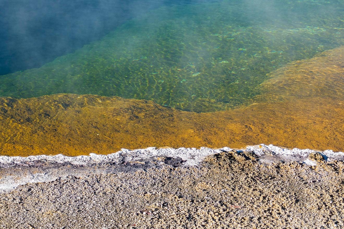 "The contrast between the hyper-saturated colors of both the water and the stream beds, and the sometime overpowering, acrid stench of the gas escaping from thermal vents was what moved me to take these pictures. In my mind, somehow they balanced each other out."
