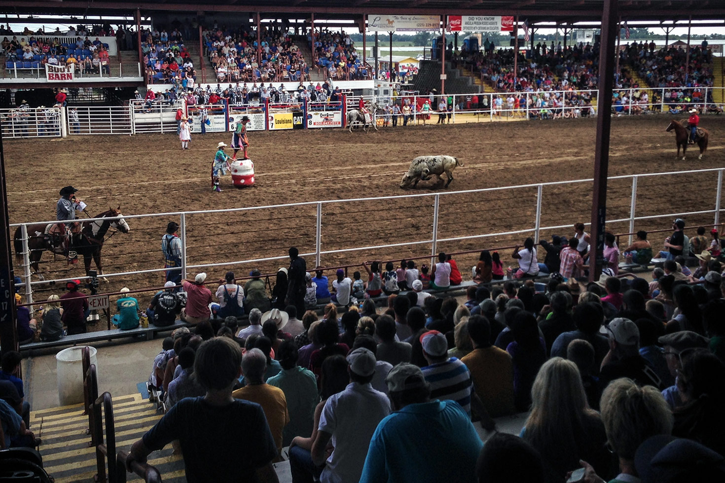 At the first rodeo, spectators sat on apple crates and the hoods of cars. The initial success led to the construction of a small arena in 1969. In the late 1990s, a trustee of the Irene and CB Pennington Foundation, Darryl Pennington, set the dream of a new, 10,000-seat multi-purpose arena in motion. The official Professional Rodeo Cowboys Association rules were adopted in 1972, and organizers contract with professional rodeo stock providers for supplies, and hire professional judges and rodeo clowns. Even with all the precautions, one inmate said that, "It gets pretty crazy out there at times."