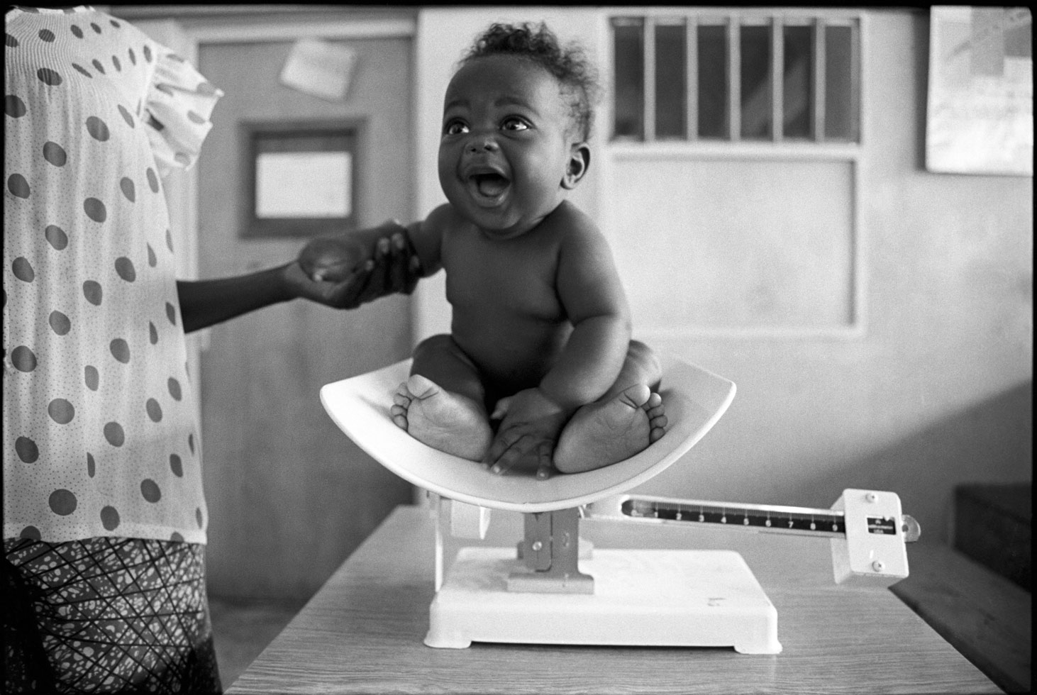 "Children are the reward of life." Congolese proverb

Maternal health clinics encourage mothers to bring their children for checkups as a way to improve the health of mothers and children. 

Kigali, Rwanda, 1993