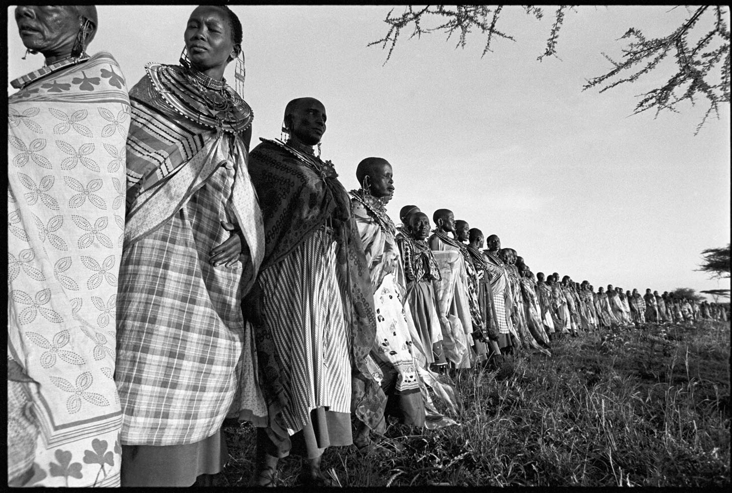 "Life is in community." African proverb

Maasai women at a blessing ceremony which takes place every seven to ten years. They spend several days talking about their problems and participating in organized rituals that have been handed down by their ancestors. 

Southern Kenya 1995