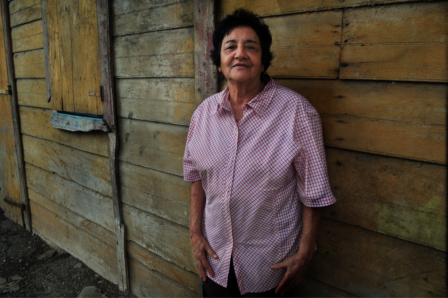 "A couple of years ago, in a small Dominican town near the Haitian border, I met and became friends with Georgette Michelen and her family. Georgette lives in a beautiful, enormous wooden house her father built at the beginning of the last century: 'The House of the Sun.'