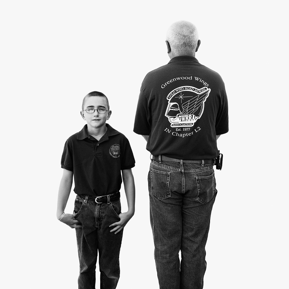 "Meeting bikers as we pass on the street, in a parking lot or at a car wash, I photograph riders in a portable studio to capture that moment just after we meet."

Eric & Nick
Honda Gold Wing