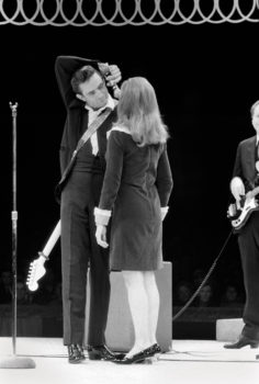 Johnny Cash and June Carter Cash, Circle Star Theater, San Carlos, CA, 1967

Although before the show both Johnny and June looked as if the last thing they wanted to do was get on stage, they put on a very very good show. Backstage somber, onstage smiling. What can I say? The Cash photos are some of the first I took on assignment for Rolling Stone. We started publishing in October of 1967; these were taken in December of that year.