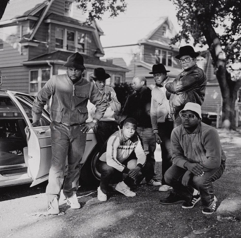 Janette Beckman 
"RUN DMC with Posse, Hollis, Queens" 1984 (printed later)  

Archival pigment print. Museum of the City of New York. Gift of Janette Beckman.