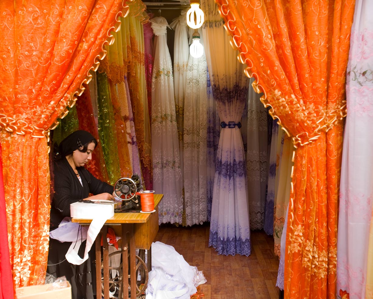 Tailor at a cloth market