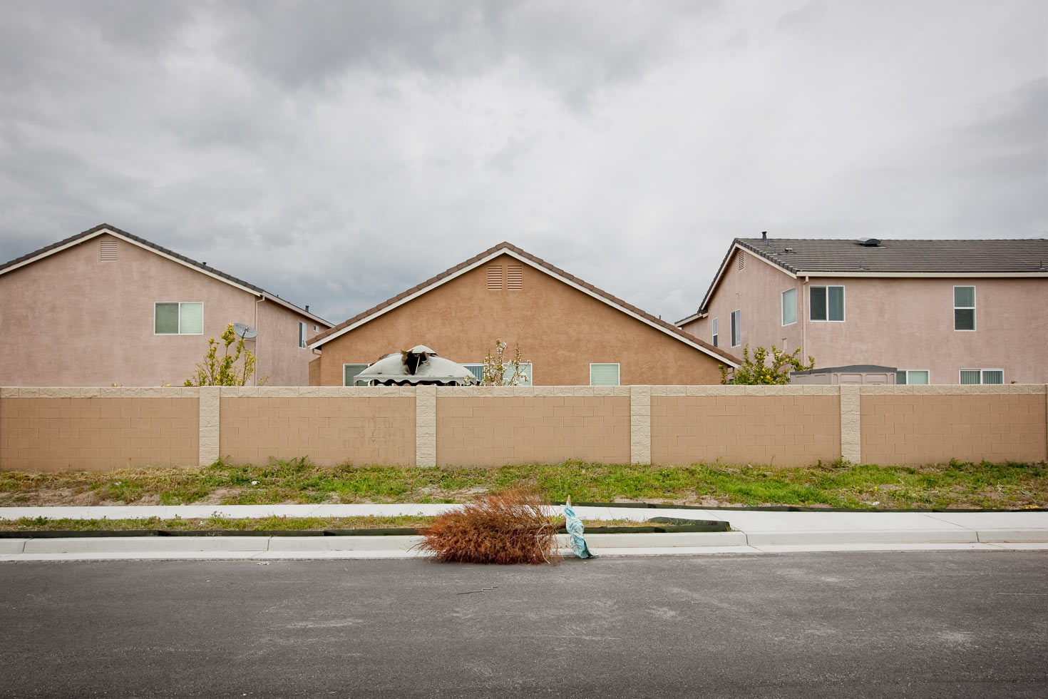 Foreclosure, USA: A Weston Ranch Christmas, 2009

A discarded Christmas tree withers on a back street of the Weston Ranch neighborhood. As mortgage interest rates reset and the foreclosure crisis swept through Stockton, the pride of ownership often soured.