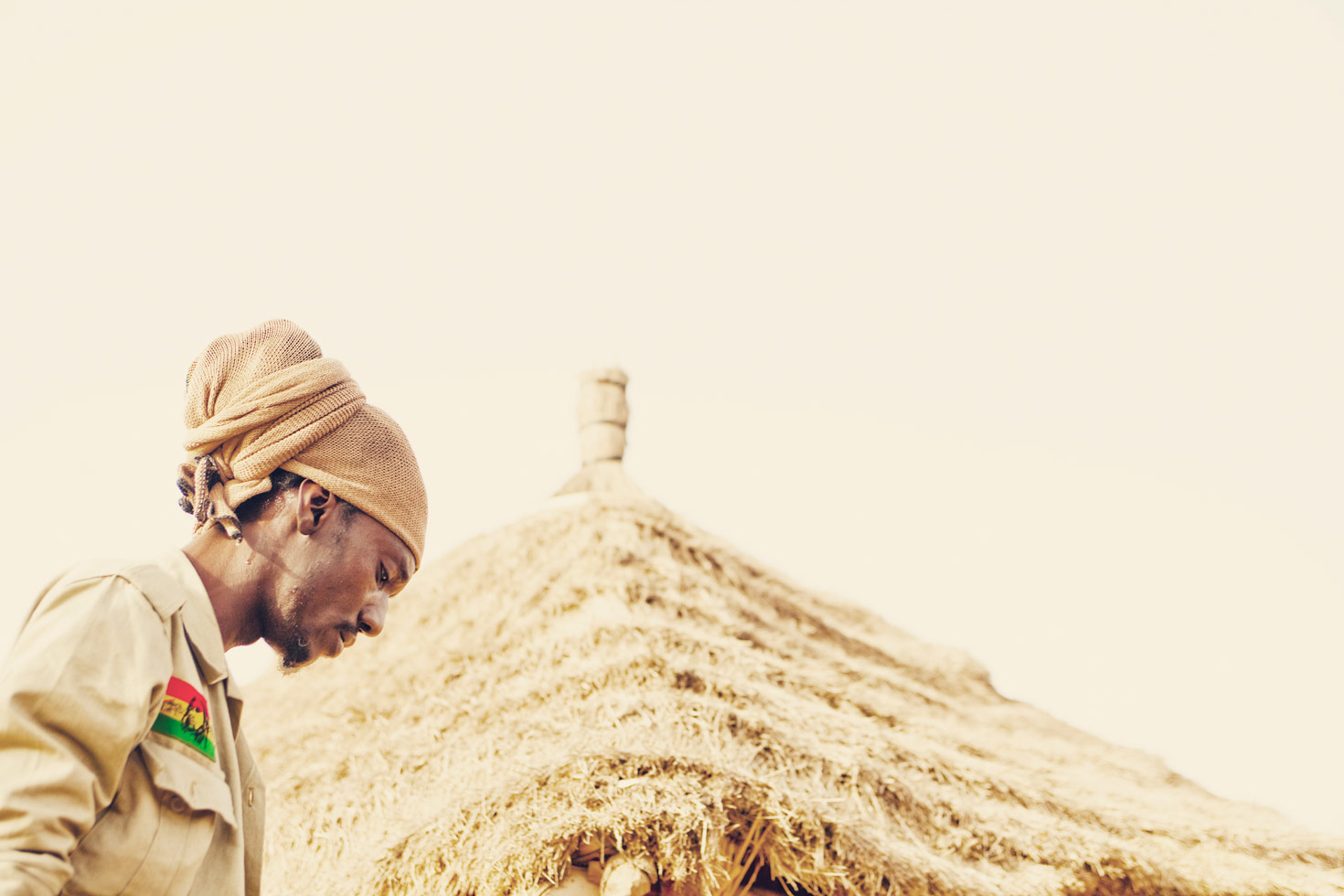 Waiting for the sun to go down. Baay Sooley, a hip hop artist and dancer from Dakar