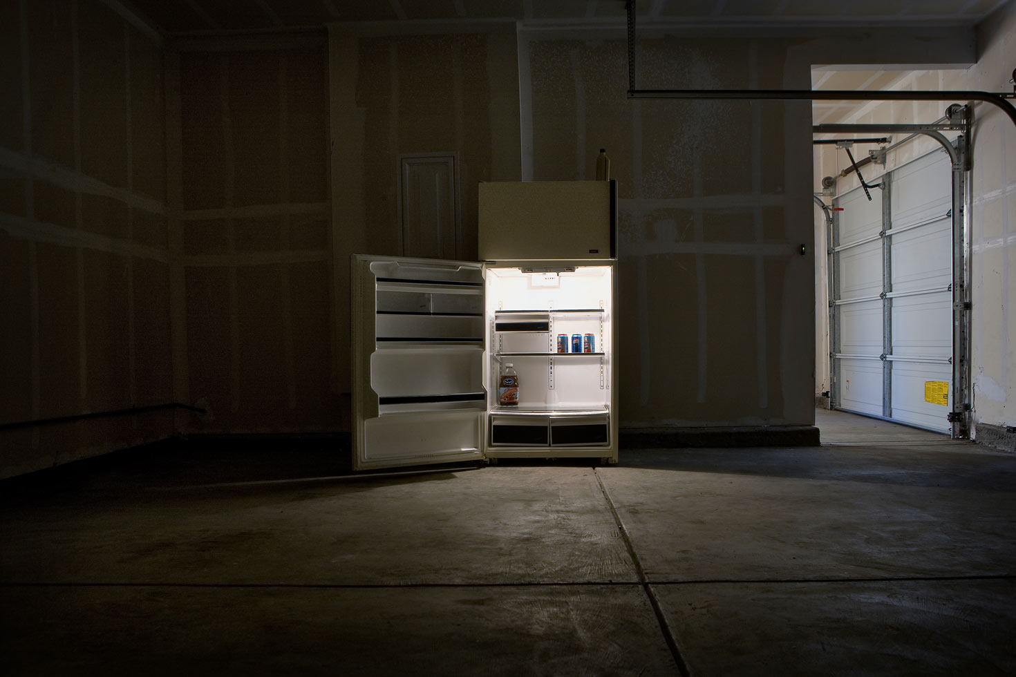 Foreclosure, USA: 3 Car Garage, 2009

A second refrigerator was left running inside this foreclosed home's three-car garage.