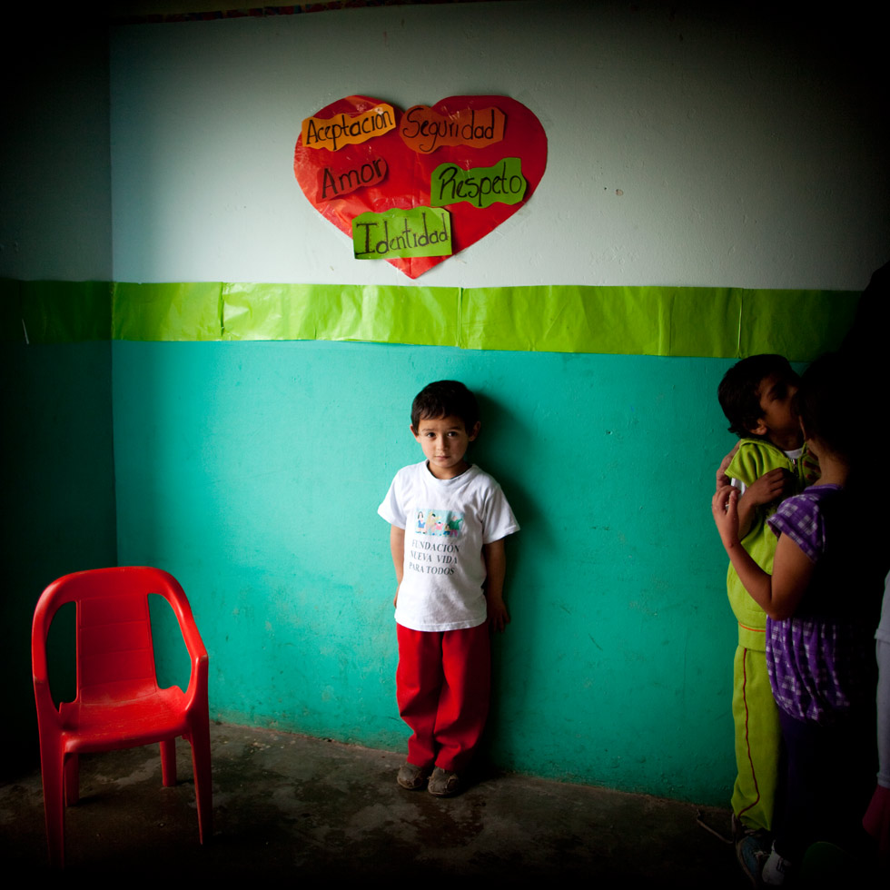 Student waiting for his portrait to be taken, Fundación Nueva Vida Para Todos, Bogotá, Colombia