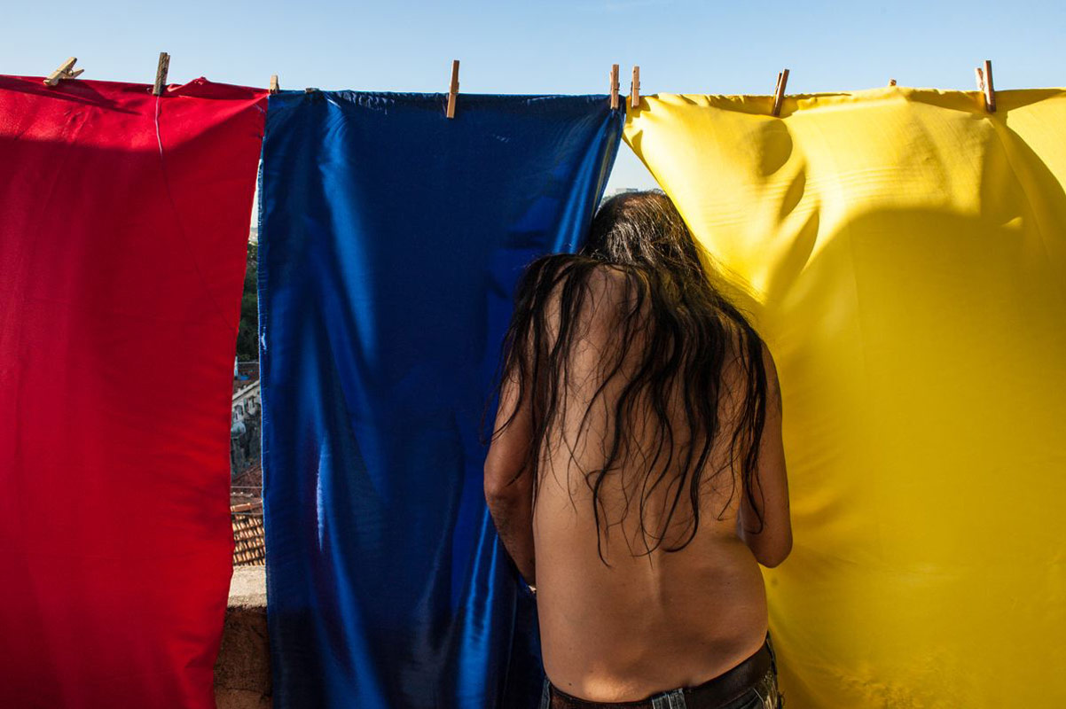 Alessandro Falco is in Rio de Janiero photographing various activities surrounding the 2014 World Cup. Two stories here: one of a Colombian community during their country's first match, and after, you'll meet Brazil's own Batman.

Colombia returned to the Cup after 16 years.