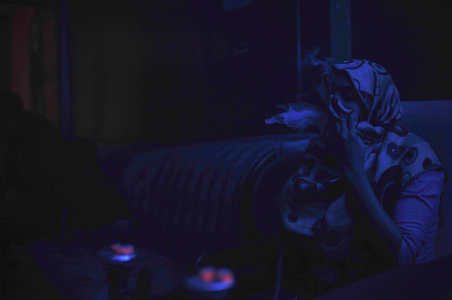 'Layla' smokes shisha at a location in St Paul. Though many youth in the Somali community are thriving, just as many struggle to maintain balance between their parents expectations and their own wishes - just like most teenagers around the world.