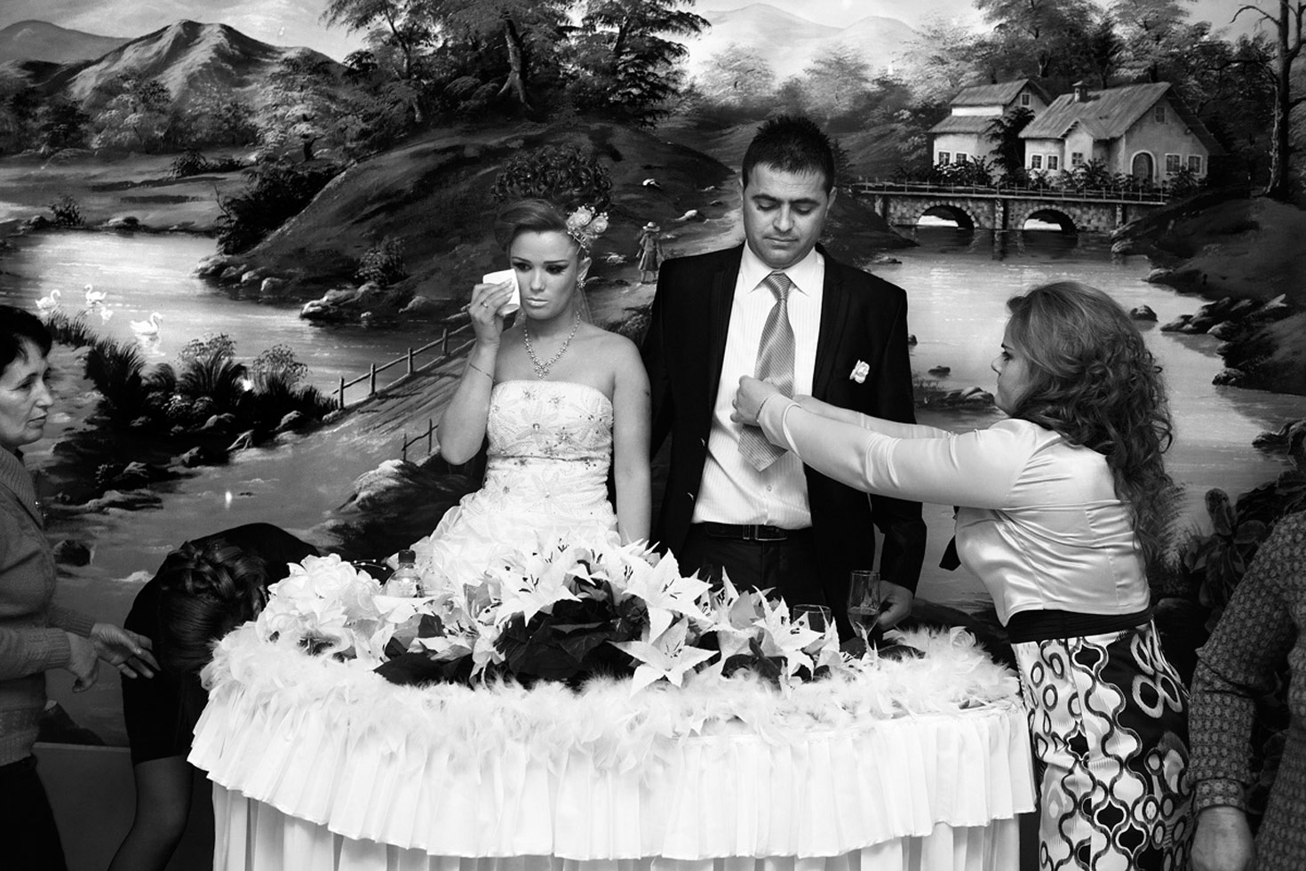 Last preparations at a wedding party. In a moment of what should have been happiness, the bride holds back tears. The marriage means she has to abandon her relatives - her husband is an immigrant from Italy and she will have to follow him there.

Tirana, Albania, 2012