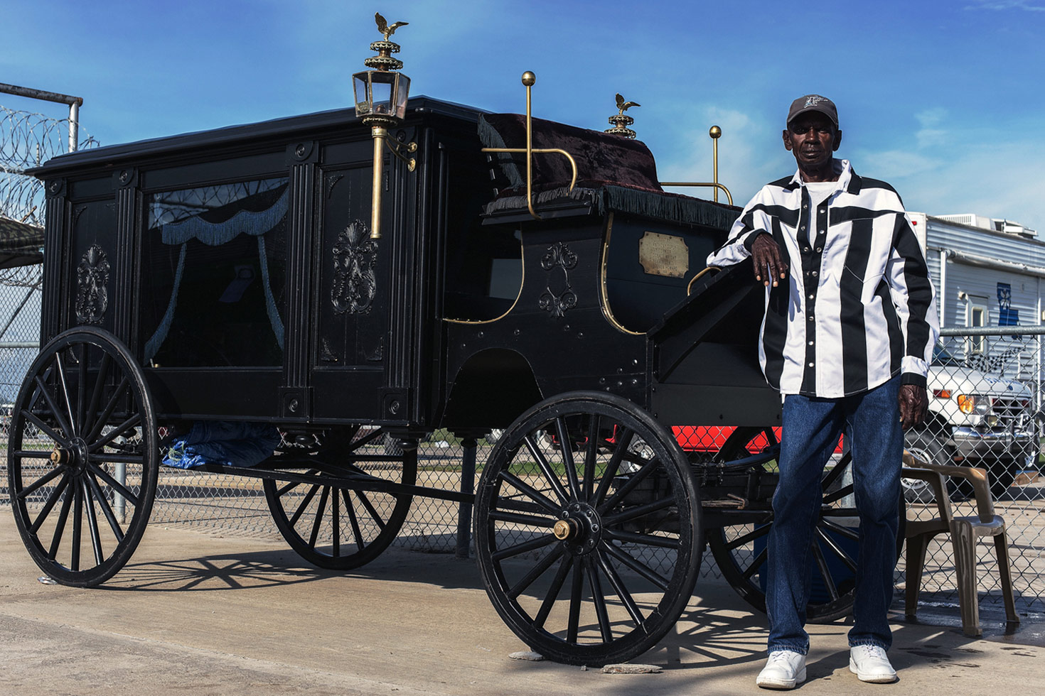 Lloyd 'Bones' Bone has been a prisoner in Angola for 42 years. Bone was convicted for life with no parole for murdering another man in a knife fight in 1971. "I'm never leaving here," he said. Bones drives the prison horse-drawn hearse, which transports dead inmates (over 40 a year) to the prison graveyard.