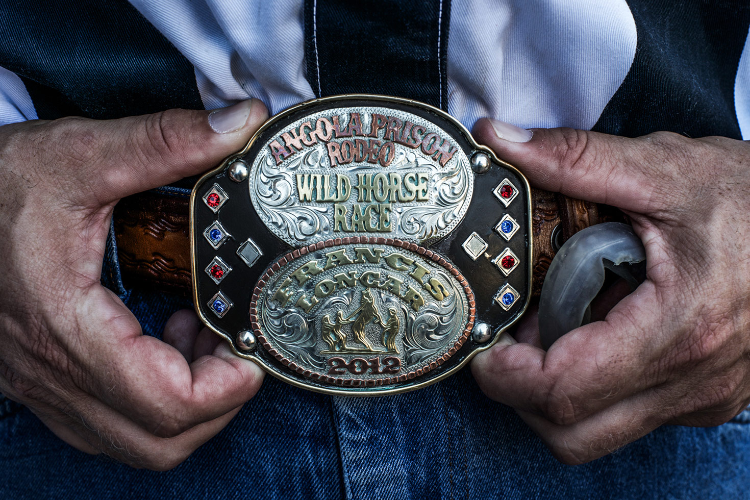 Joe owns the 2012 Angola Prison Rodeo buckle.
