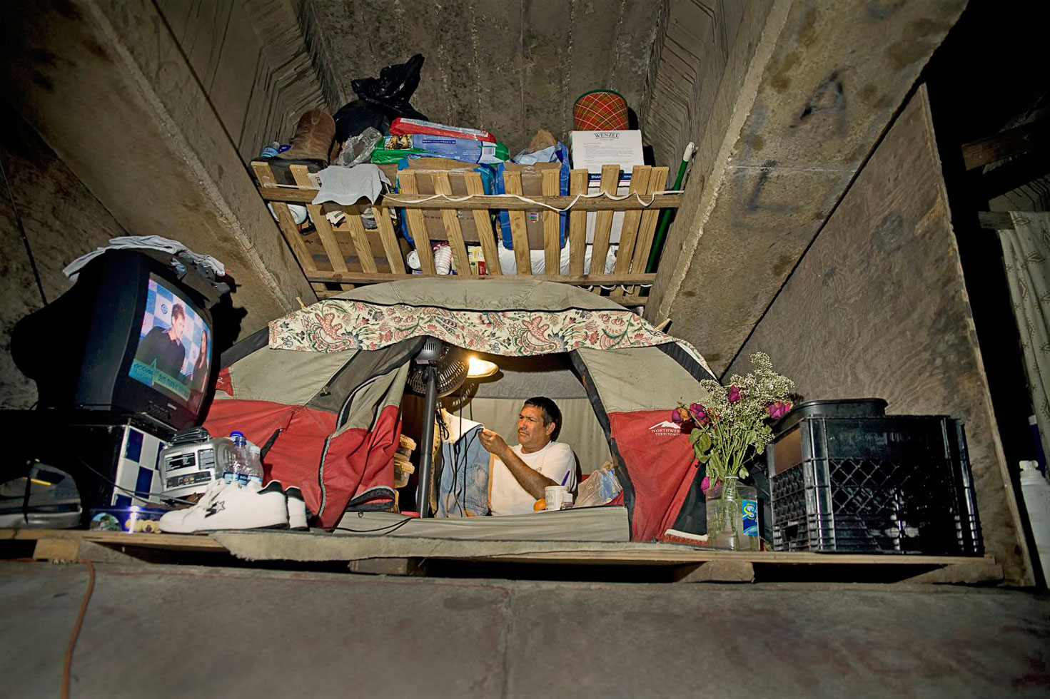 Ron Book was also the head of the Miami-Dade Homeless Trust; he decided that the parolees can wear leg monitors and check in under the Causeway each day. Each man and woman has a curfew at night and is allowed to leave at a set time each morning. In the past the homeless people got electricity from rewiring streetlights. In this camp people own generators to run television and appliances.