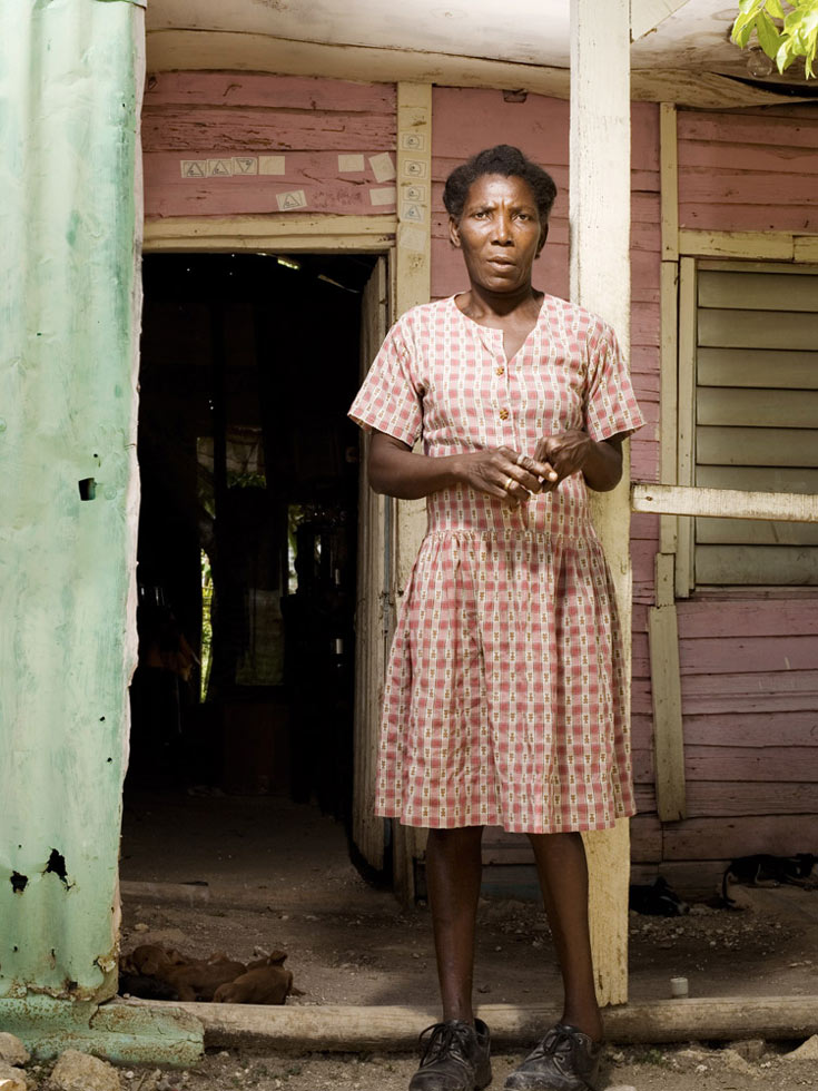 Altagracia, "Ta ta," lives in this house with two of her three children. Three years ago, she joined a Christian church for the sole reason of being provided free rice every week for her family.