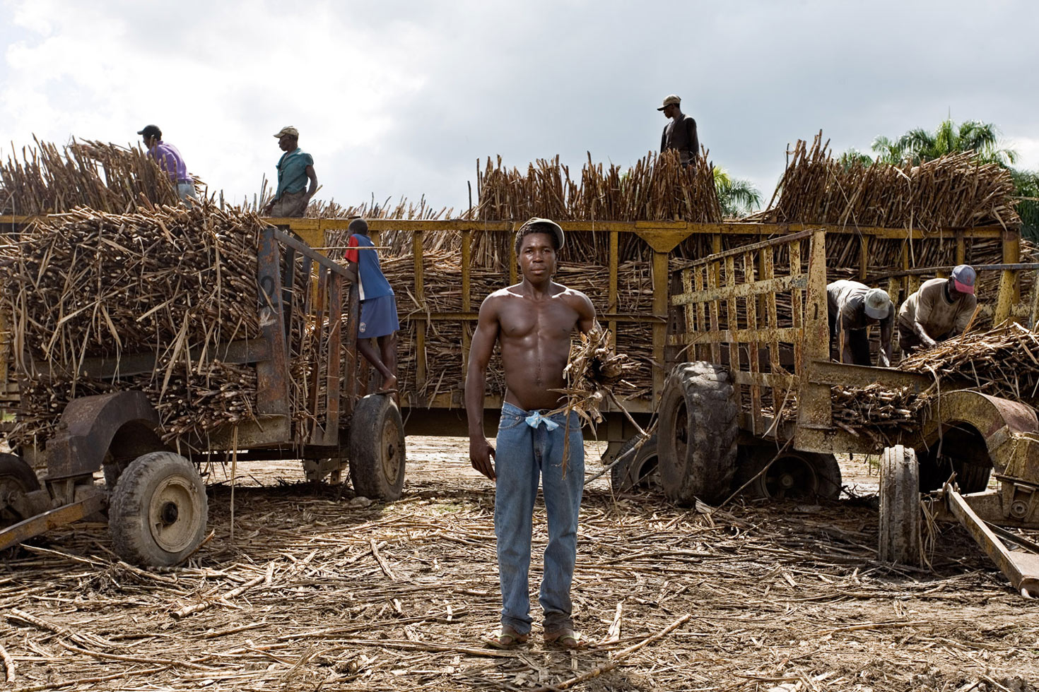 Yoni moved from Haiti to Las Pajas four years ago. Yoni's cousin helped get him declared a citizen two years later. If someone asks him if he is Haitian or Dominican, Yoni responds, "Soy legal" (I'm legal). He cuts sugar cane, earning about 300 pesos every two days.