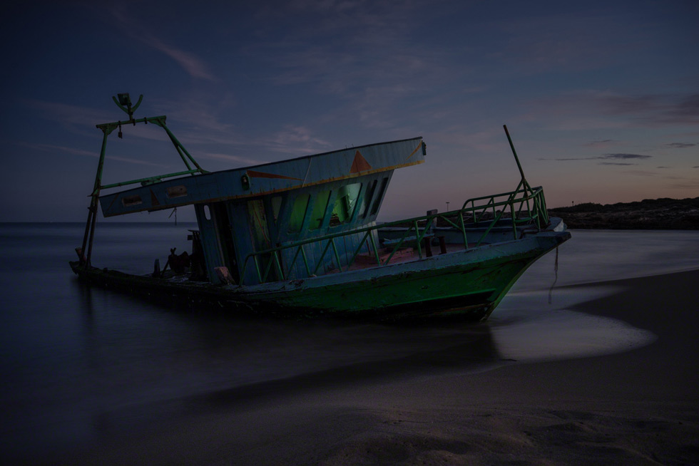 Since 1988 nearly 20,000 people have died attempting to reach European ground from Africa, the Middle East and Asia. Massimo Cristaldi is photographing the beaches and cliffs, and the boats sometimes still forlorn at shore.

June, 2013, a ten meter long boat arrived at the Eloro beach with 70 people onboard.