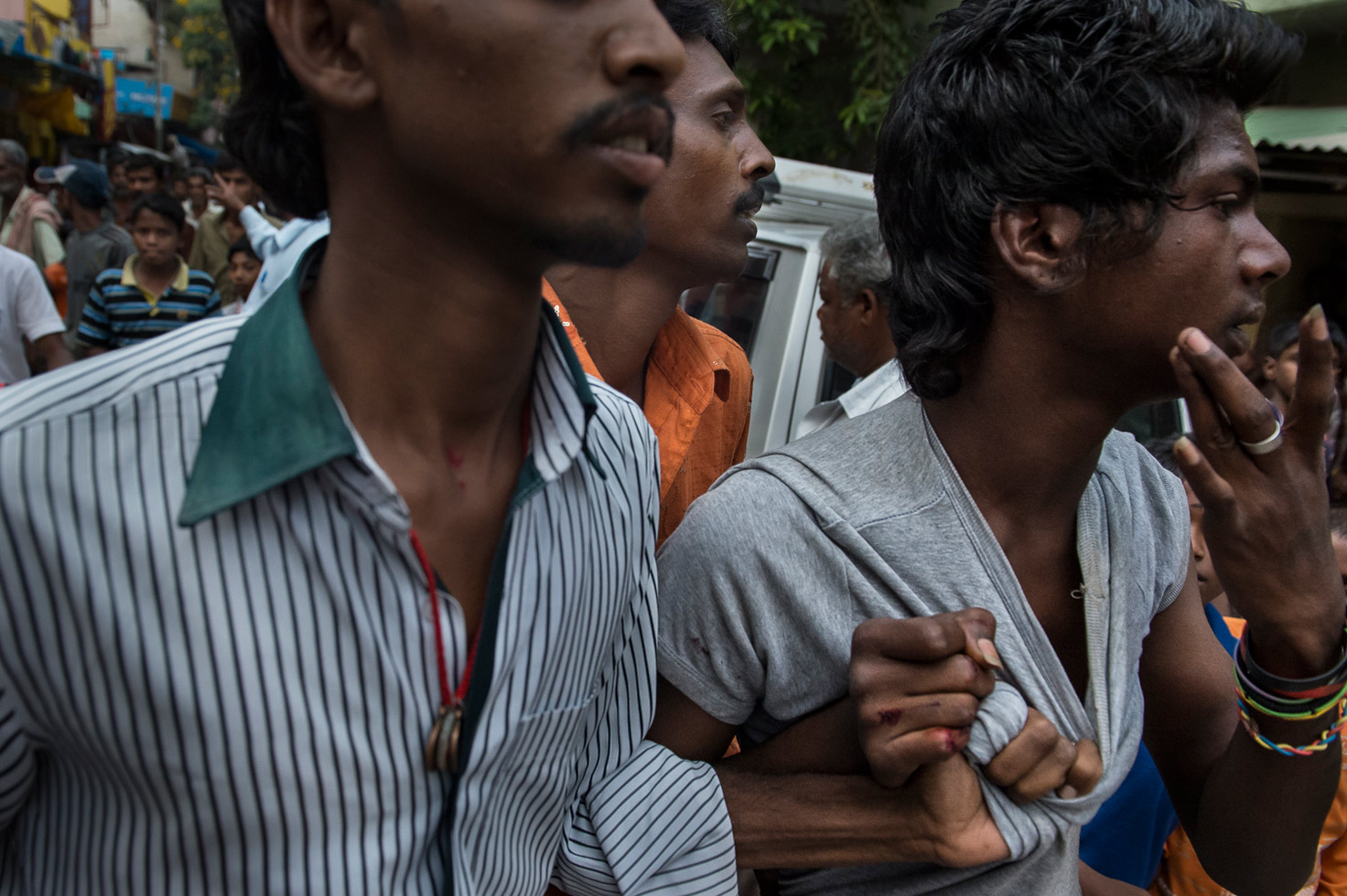 Two men drag a third man away from a dowry-related fight in the Dr. Ambedkar Nagar neighborhood of Bangalore. As materialism grows in a globalized Indian society, so too do the dowry demands. Dowry is no longer confined to a single transaction around the marriage period, but an ongoing demand on the wife and her family, one that is frequently manifested by sustained long-term harassment.