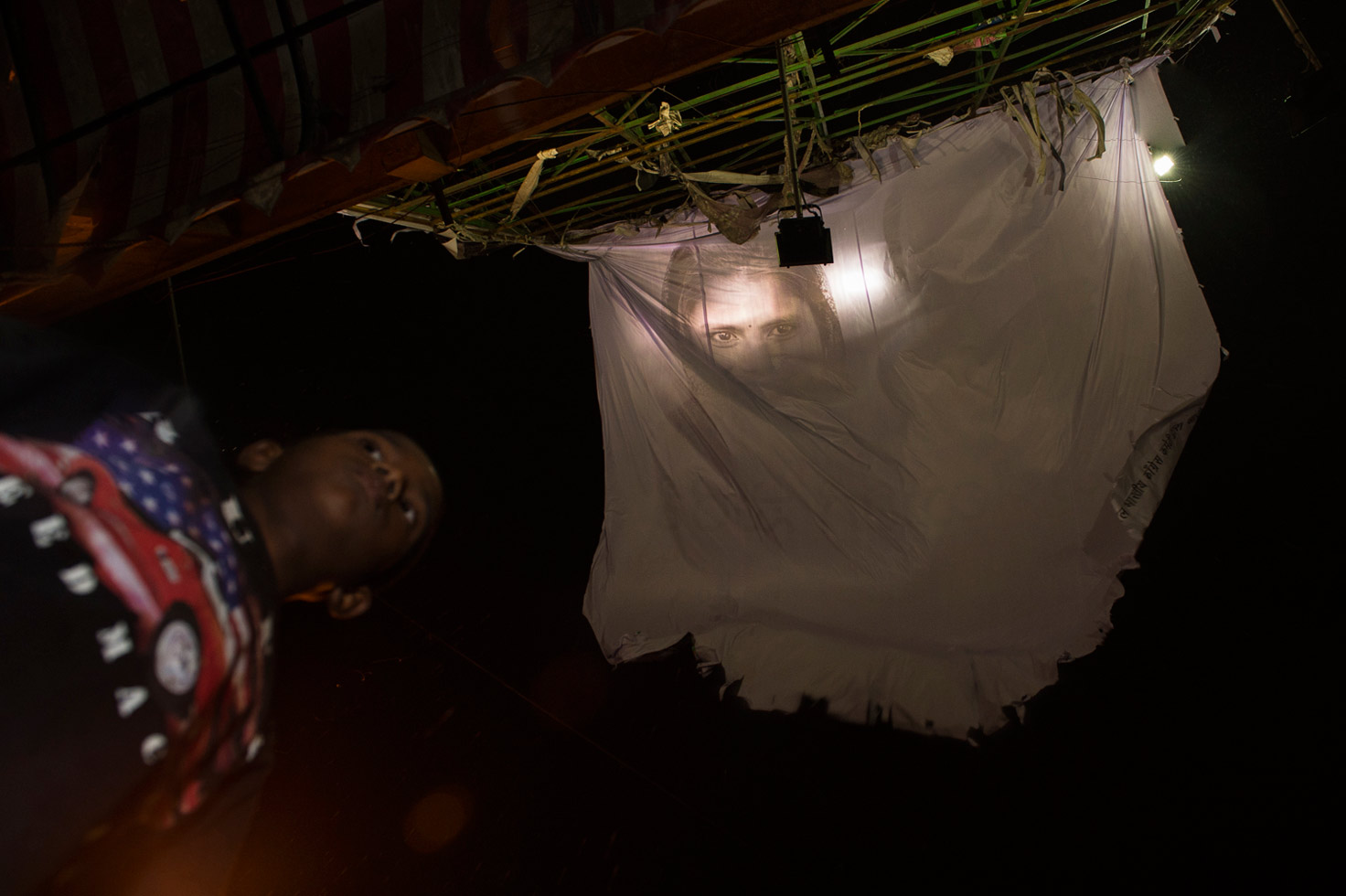 An election campaign poster for Rahul Gandhi becomes untethered in a storm. Despite an official reporting of one dowry-related death per hour, such deaths remain widely under-reported.