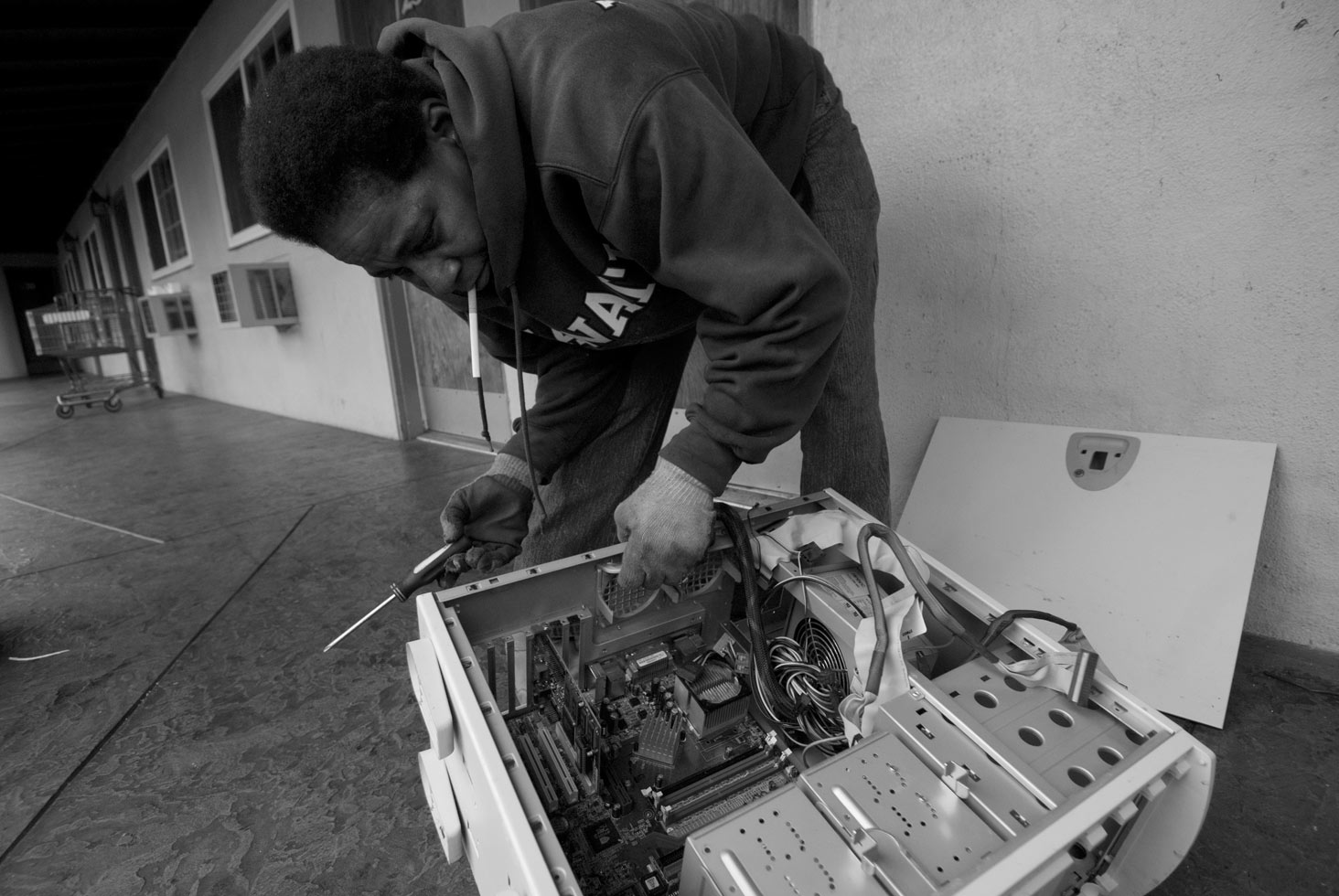 Denise has become very efficient in stripping all the copper and metals off waste items she finds every day.