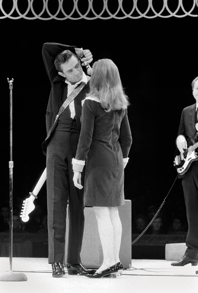 Johnny Cash and June Carter Cash, Circle Star Theater, San Carlos, CA, 1967

Although before the show both Johnny and June looked as if the last thing they wanted to do was get on stage, they put on a very very good show. Backstage somber, onstage smiling. What can I say? The Cash photos are some of the first I took on assignment for Rolling Stone. We started publishing in October of 1967; these were taken in December of that year.
