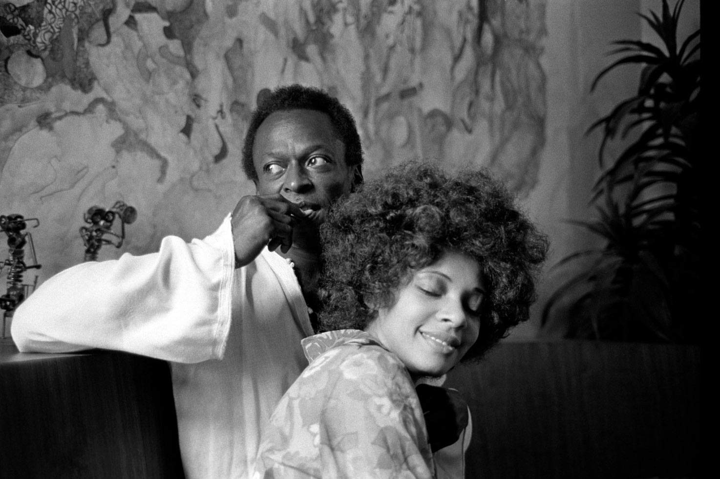 Miles and Betty Davis at home, New York City, 1969

I knew Betty because we did a big photo fashion shoot with her for Rags (Baron's fashion mag); she was a first class 'fashionista' who knew clothes, had great taste and was instrumental in getting Miles to change the look of his wardrobe. She said, "Baron, come on up and photograph me with Miles." I had always wanted to take portraits of Miles and was not disappointed with the outcome.