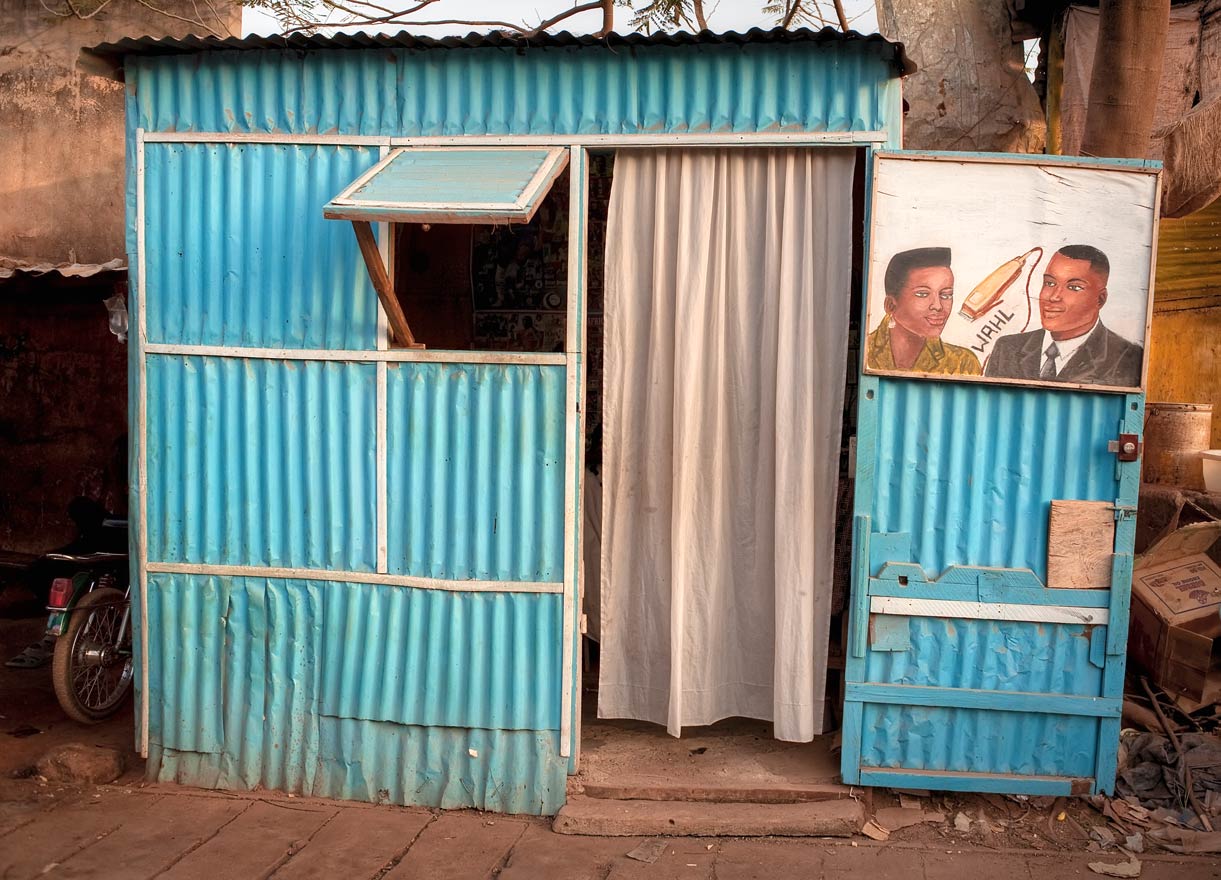 Makeshift lunch counters, coffee stands, stationery stores and barbershops are on nearly every corner and side street.