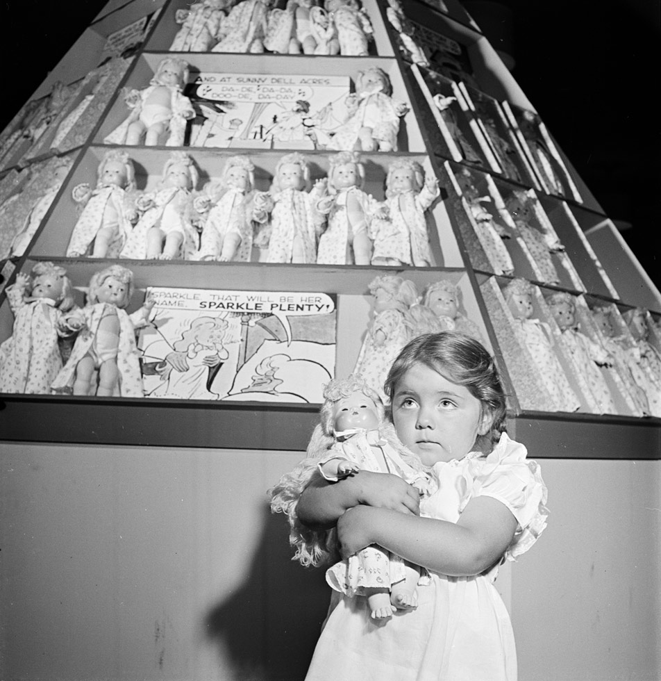 Girl With Dolls