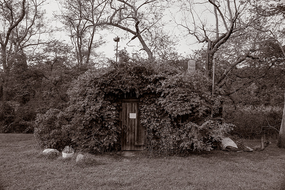 Small outbuildings are found across the property