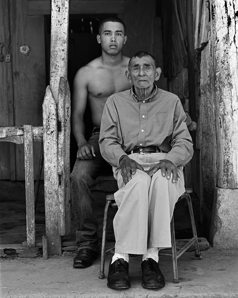Juan, 94, and great-grandson Elgin, 24. On another self-assignment, of rephotographing people 20 years later, I made this double portrait of Papa Juan and his handsome, adult great grandson.